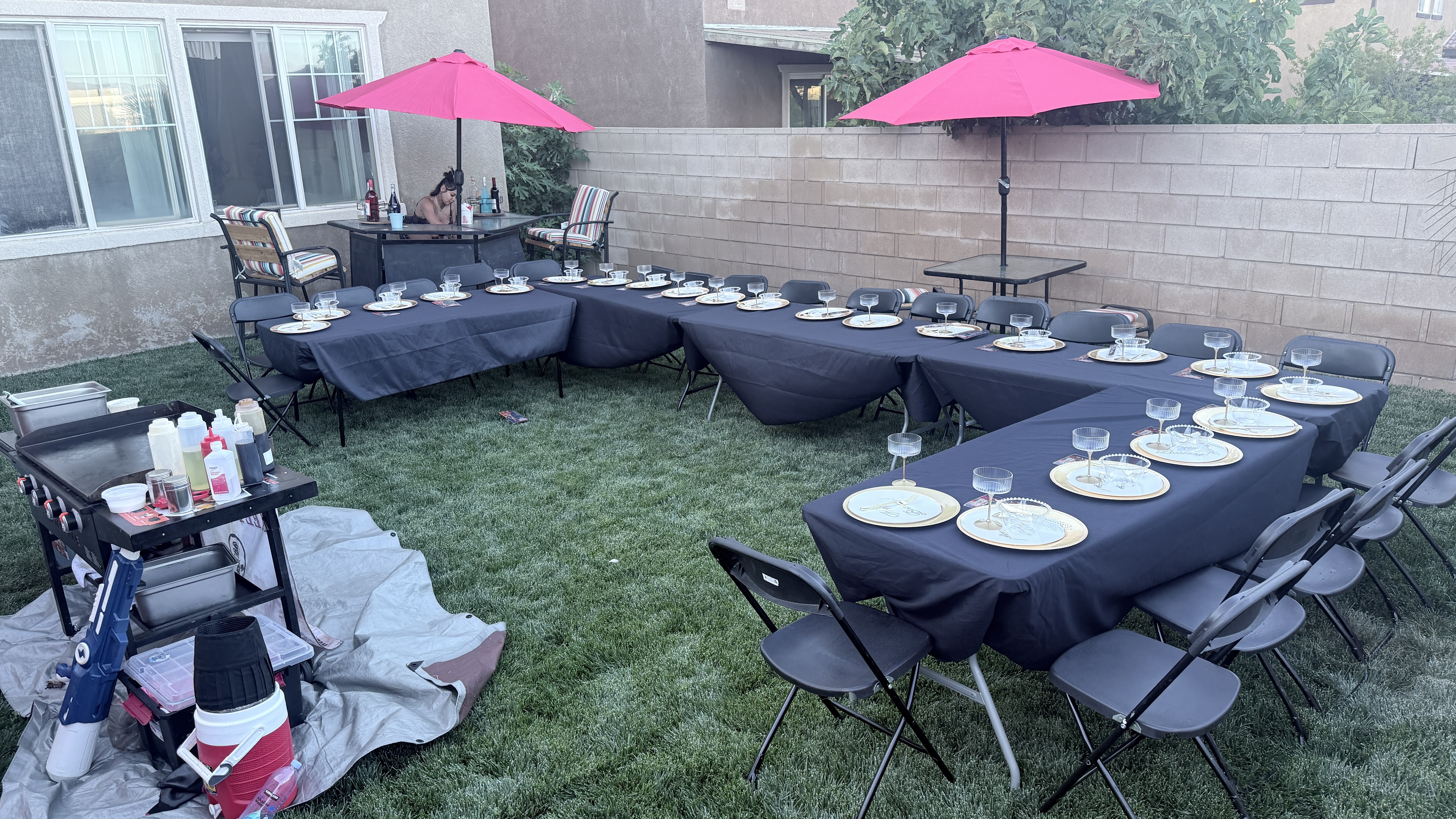 Large backyard hibachi table prepared for guests